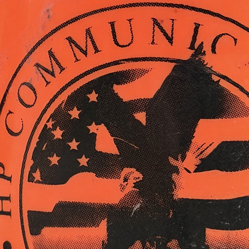 An orange poster with black lettering and a circular graphic.